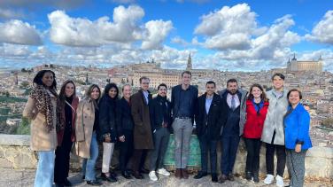 Family photo of young delegates on a field trip to Spanish city. 